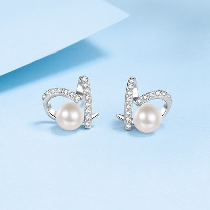 Boucle d'oreille à tige de fiançailles avec perles d'eau douce